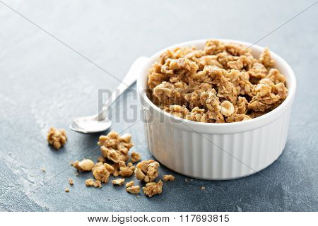 Peanut butter granola in white ramekin