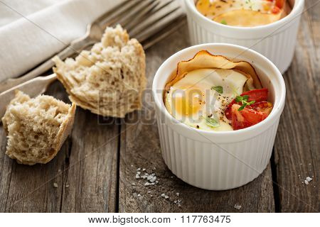Baked eggs in small ramekin
