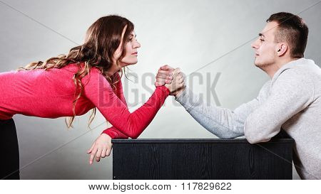 Arm Wrestling Challenge Between Young Couple