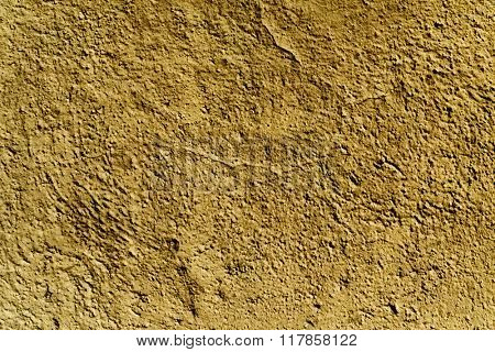 closeup of a rustic brown plastered wall