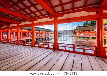 HIROSHIMA, JAPAN - DECEMBER 3, 2015: The open air halls of Itsukushima Shrine on Miyajima Island. The shrine is known for the famous floating torii gate.