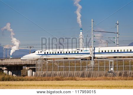 Shizuoka - DEC 19: Shinkansen bullet train and Mountain Fuji on DEC 19,2015 , Shizuoka ,Japan. Shinkansen is world's busiest high-speed railway operated by four Japan Railways companies.