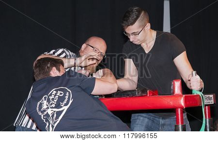 Unidentified Sportsmen Compete In Arm Wrestling