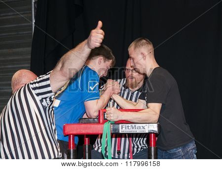 Unidentified Sportsmen Compete In Arm Wrestling