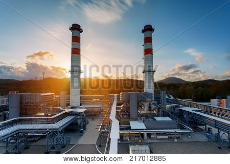 Power station the area of the power station. Sunlight Sunset Sunrise Ecology. Two pipes