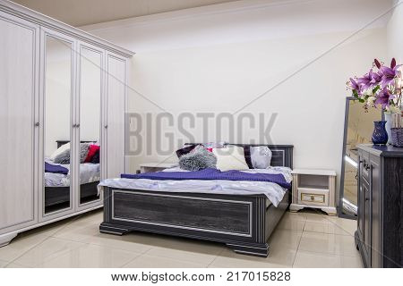 view of Cozy modern bedroom interior with furniture