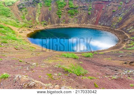 View of the volcanic Crater Lake Kerid in the Grimsnes area in south Iceland