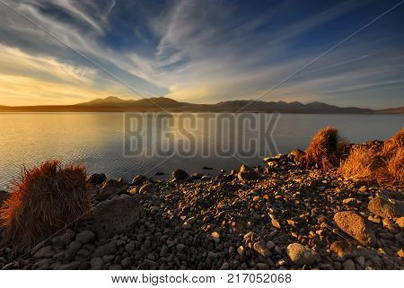 Beautiful lake reflections with nice blue sky and clouds