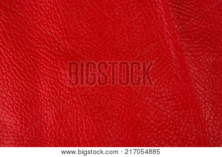red natural leather texture background, closeup, macro