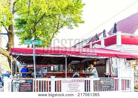Bar Harbor, Usa - June 8, 2017: People Eating Inside Cherrystones Restaurant Outdoor Patio Area In D