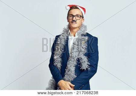 man in a business suit, corporate, tinsel, new year, holiday.