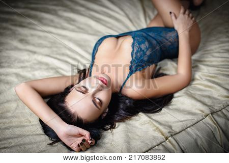 Amazing young woman in a sexy lingerie