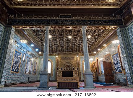 Cairo, Egypt - December 2, 2017: Interior of public mosque of Manial Palace of Prince Mohammed Ali Tewfik with wooden golden ornate ceilings Cairo Egypt