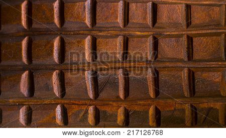 Abstract background of old worn wooden boards of different colors close up