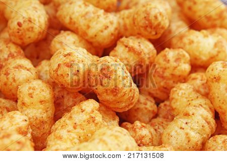 Peanut flovored snacks. Snack flips. Texture pattern closeup. Food photo