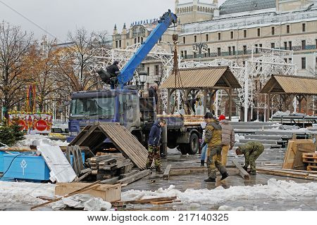 Moscow Russia - February 27 2017: Workers dismantle Revolution square after Russian national festival 