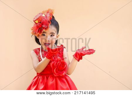 Cute Asian Girl In Vintage Costume Show Hand In Left