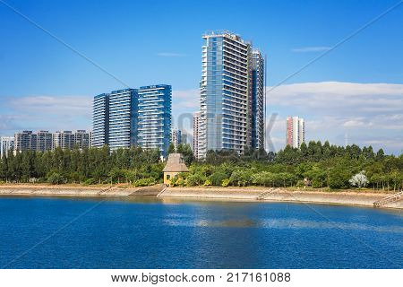 Xiamen skyline with reflection, beautiful coastal city, China