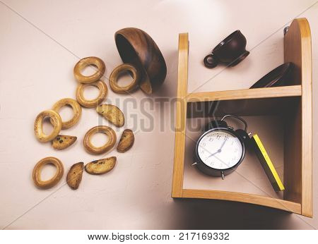 The alarm rings, drying and coffee fall