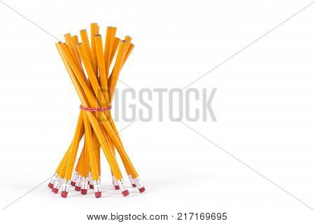 Simple pencils on a white background. Pencils in conjunction with a place for text. A few simple blunt pencils. Objects tools for drawing and writing.