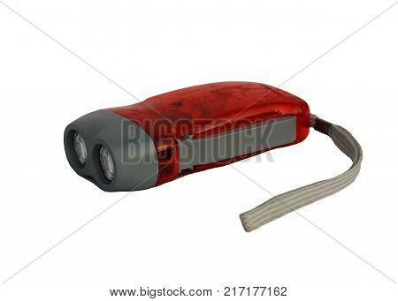 Electrodynamic pocket torch red with accents of gray and a strap for carrying the insulation
