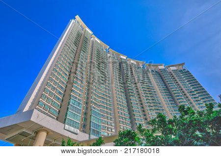 Hong Kong, China - December 11, 2016: perspective view of high rise skyscrapers near Citygate, a commercial complex close to Tung Chung MTR Station, the terminus of Tung Chung Line in Lantau Island.