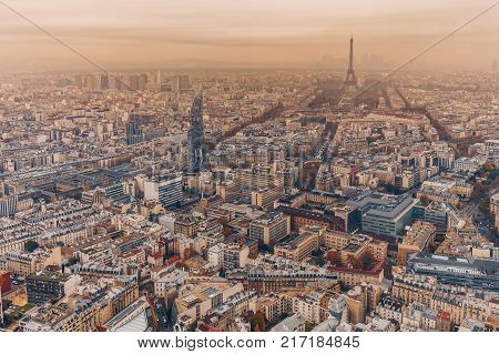 Aerial Panorama Of Paris City In Late Autumn From Maine-montparnasse Tower At Sunset.