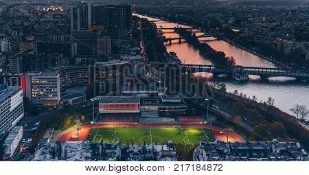 Aerial Panorama Of Paris City In Late Autumn From Maine-montparnasse Tower At Sunset.