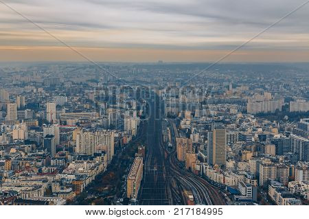 Aerial Panorama Of Paris City In Late Autumn From Maine-montparnasse Tower At Sunset.