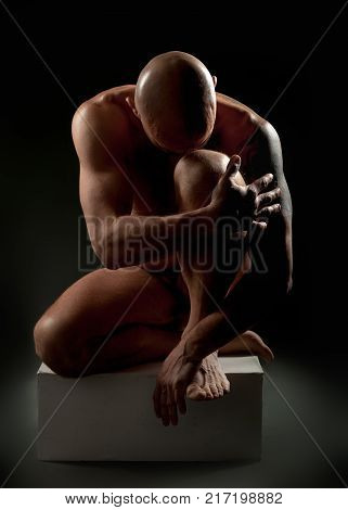 studio portrait of athletic man. Body skulptur