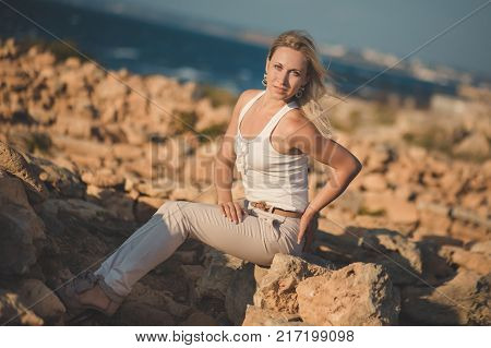Amazing Lady Blond Woman In Light White Stylish Clothes Sexy Posing On Sea Side Beach Air.sparkler G