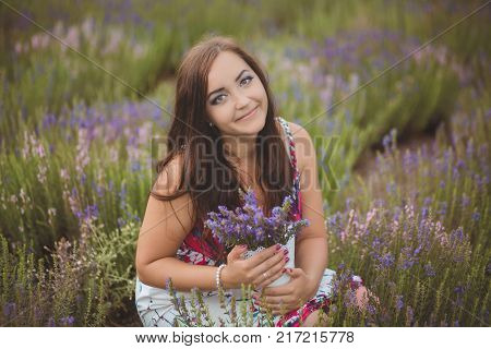 Beautifull Brunette Buxom Nubile Lady Woman With Deep Blue Eyes Posing On Field Of Spring Lavender W