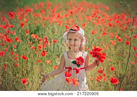 Cute Blond Young Girl Child Stylish Dressed In White Handmade Hooked Dress Wearing Airy Hat Top Posi