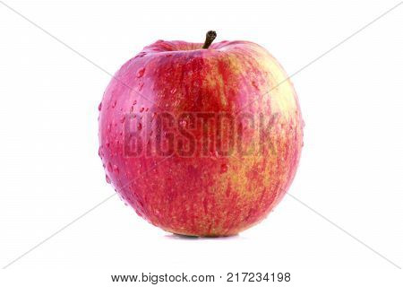 Red apple isolated on white background. Fresh raw organic fruit with water drops.