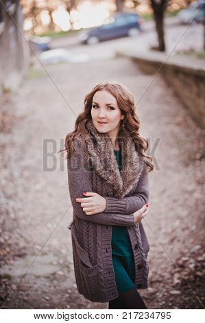 Pippin Cover Lady With Brunette Hairs Deep Blue Eyes Pout Pink Lips Wearing Cozy Warm Jacket Sweater