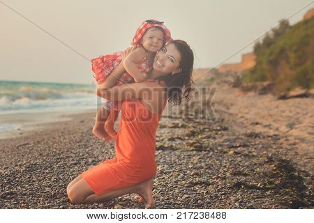 Hokum Tender Scene Of Beautiful Adorable Young Mother Enjoy Life Time Summer Vacation With Her Littl