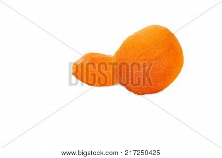 Two sweet and delicious dried apricots. Isolated on white background.