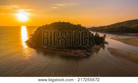 stunning sunset at Kala island. Layan beach and Bangtoa beach is the same beach the left side is Bangtoa beach the right side is Layan beach in the end of Layan beach has Kala island