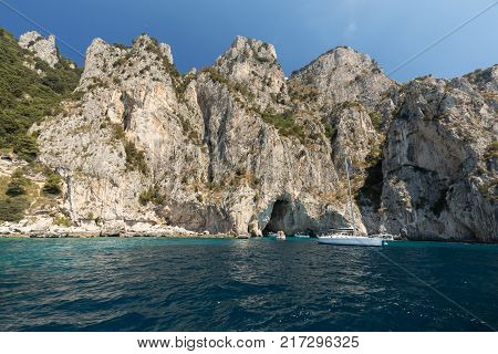 CAPRI ITALY - JUNE 13 2017: Boats with tourists near Grotta Bianca and Grotta Meravigliosa Capri Italy