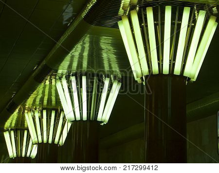 Rectangular lights on a granite column, in a circle,