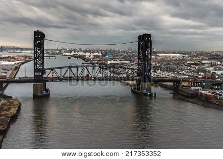 JERSEY CITY NEW JERSEY - DECEMBER 5: An overcast scenic view of the Route 7 Wittpenn Bridge which spans the Hackensack River between Jersey City and Kearny on December 5 2017 in New Jersey.