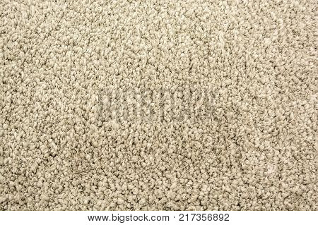 Close up of grey domestic woolen carpet texture