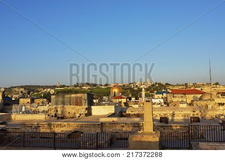 View of Al Aqsa Mosque and the Mount of Olives Jerusalem Old city from the Temple Mount roofs at sunset Dome of the Rock and Al Aqsa Mosque in Jerusalem Israel