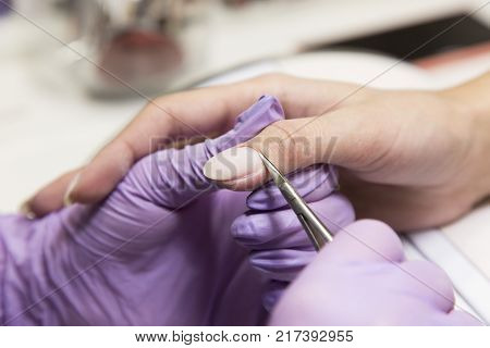 Cute Girl Master Doing A Manicure.