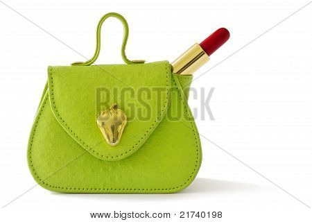 Grüne Tasche und roten Lippenstift