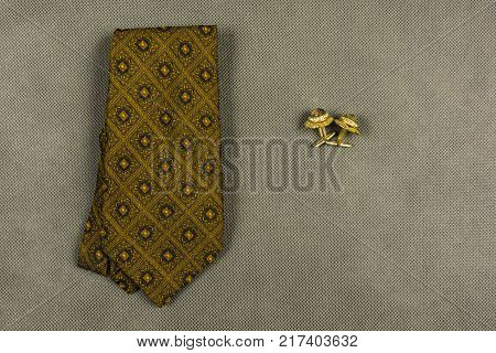 Attributes of an elegant man - tie and cufflinks.