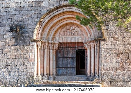 View Of The Main Entrance To The Church Of Santa Maria De Siurana In Siurana Tarragona Spain. Copy S