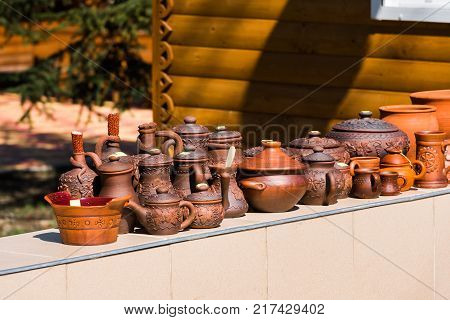 Many Pottery Are Sold On The Street In The City Park Goryachy Klyuch Russia. Copy Space For Text