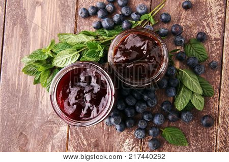 Fresh blueberry jam with toast or bread for breakfast.