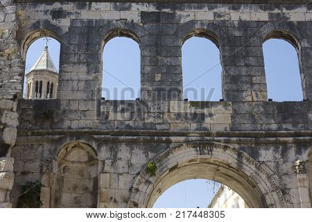 SPLIT, CROATIA - AUGUST 11 2017: Diocletian Palace detail with Sain Domnous bell tower in the background in Split
